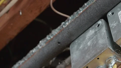 Electrical Boxes with Wires on Basement Wall ROTATE LEFT Stock-Footage 104874113