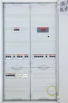 Electrical Cabinet with breakers closed protective panels Stock Photos