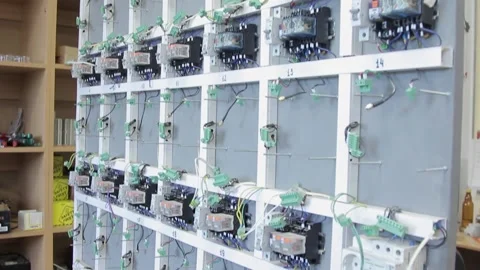 Electrical cabinet with cables and circuit breakers on a large stand. Stock Footage 194676466