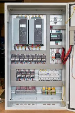 Electrical Cabinet with frequency converters, controller, circuit breaker. Stock Photos