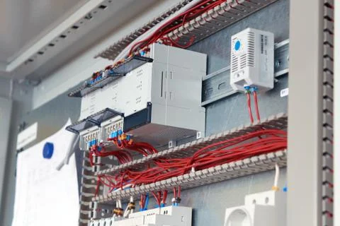 In the electrical Cabinet network electronic devices or controllers. Stock Photos