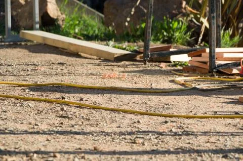 Electrical cable laying in the dirt on a construction site Stock Photos