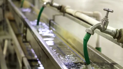 The electrical cables after assembly pass through the containers with cold water Stock Footage 153178894