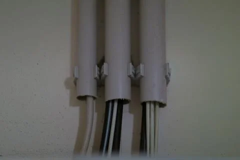 Electrical cables in wall conduits. Stock Photos