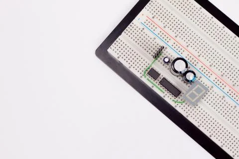 Electrical circuit on breadboard on isolated white background Stock Photos