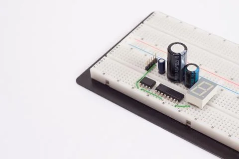 Electrical circuit on breadboard on isolated white background Stock Photos