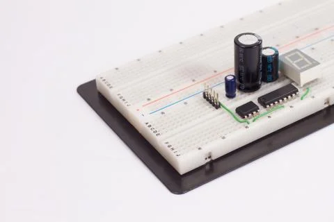 Electrical circuit on breadboard on isolated white background Stock Photos