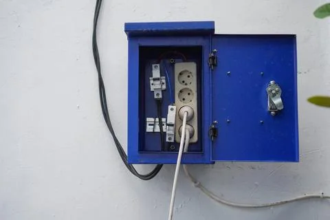 Electrical circuit breaker and socket, inside aluminum steel cabinet Stock Photos