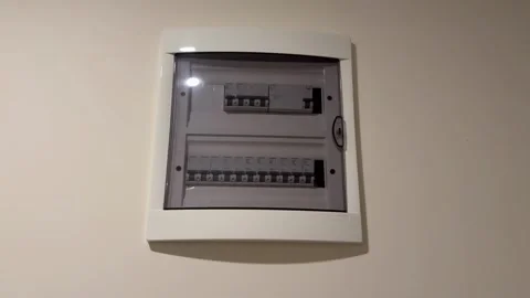 Electrical circuit breaker box on wall covering safety and utility in uncle.. Stock Footage 331461956
