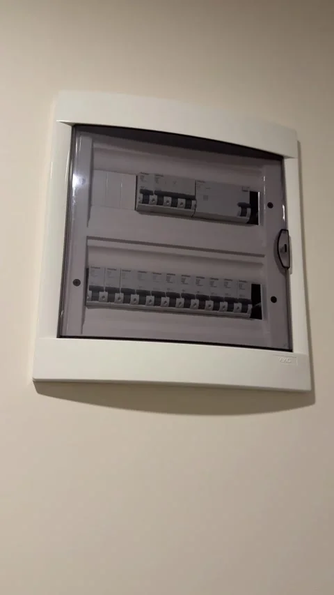 Electrical circuit breaker panel on light wall, suitable for home safety an.. Stock Footage 330927478