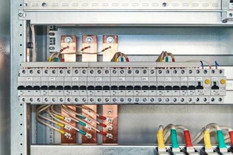Electrical circuit breakers and differential switches in electrical Cabinet. Stock Photos