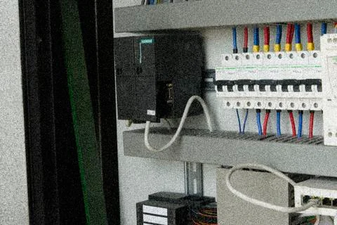 Electrical circuit breakers in an electrical switchboard. Add film grain effect Stock Photos
