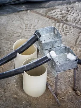 Electrical conduit and junction boxes under construction Stock Photos