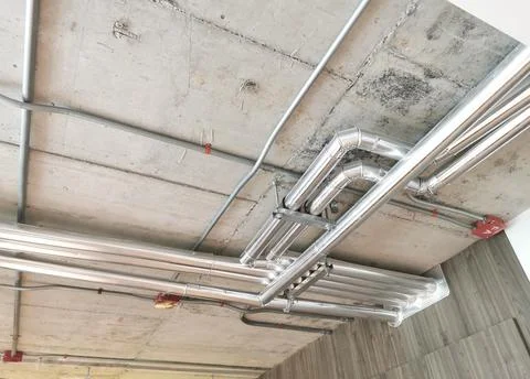 Electrical conduits under the building Stock Photos