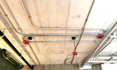 Electrical conduits under the building Stock Photos