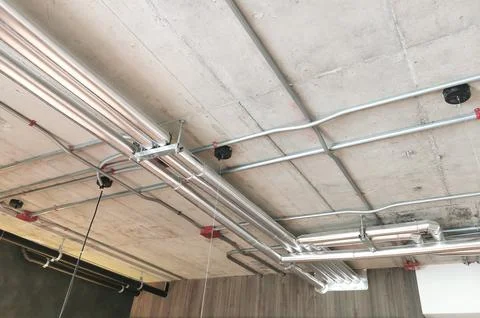 Electrical conduits under the building Stock Photos