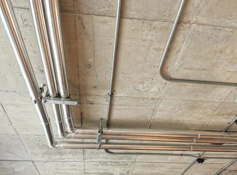 Electrical conduits under the building Stock Photos