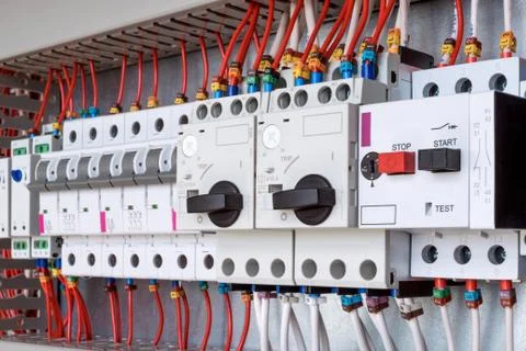 The electrical control panel are circuit breakers protecting the motor. Stock Photos
