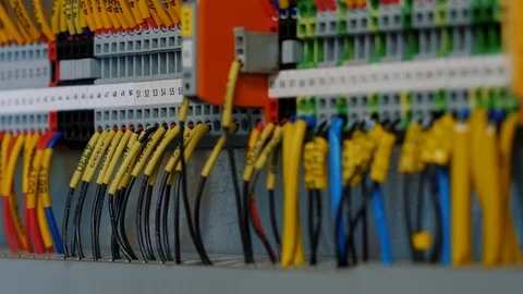 Electrical control panel with multiple switches and wires cable, terminal socket Stock Footage 120231346