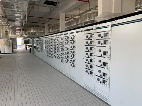 An electrical control room of a power distribution facility Stock Photos