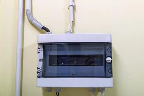 Electrical Distribution Box Installed on Wall with Cable Conduits, Household Pow Foto stock