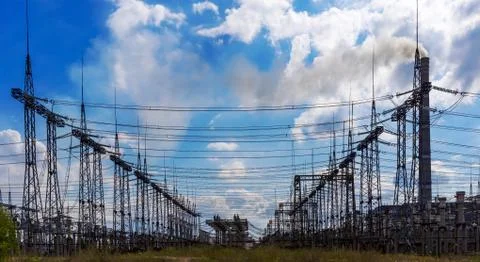 Electrical distribution station, transformers, electricity high-voltage lines Fotos de archivo