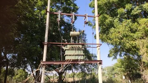Electrical distribution system, electricity supply transformer at farm with powe 库存照片