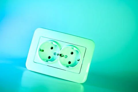 Electrical double socket for connecting devices in azure emerald Stock Photos
