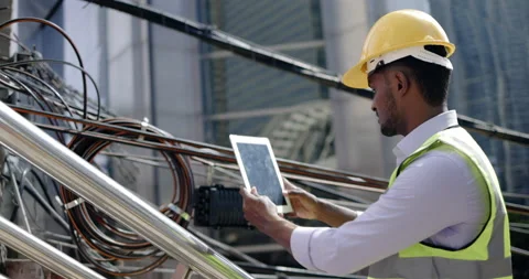 Electrical engineer checking electrical wires Internet cables on electric Видео 169940137