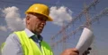 Electrical Engineer Checking Plan Verify Energy System Project High Electricity 4k or 4k+ Resolution