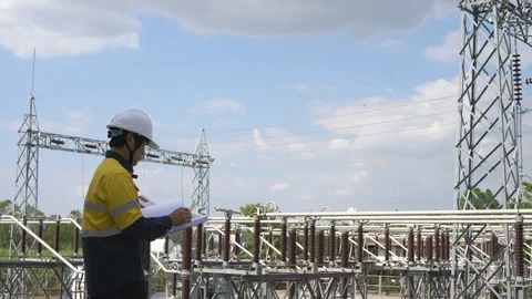 Electrical Engineer Checking Plan Verify Energy System Project High Electricity 動画素材 125415725