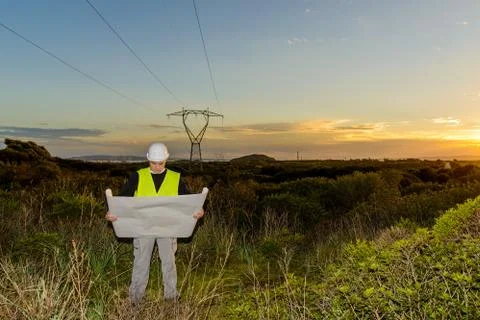 Electrical Engineer Controls the Power Line. Stock Photos