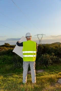 Electrical Engineer Controls the Power Line. Stock Photos