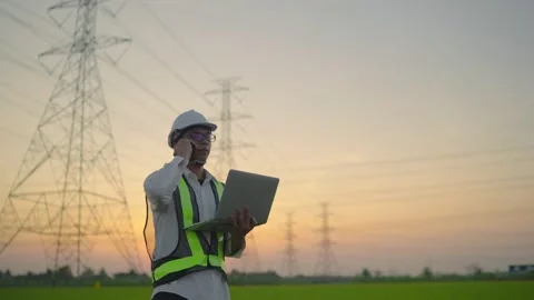 Electrical engineer discussing project work on mobile phone. Stock Footage 148355978