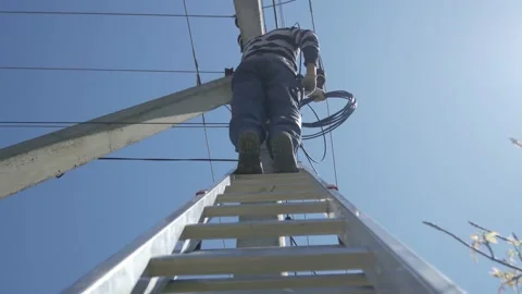 Electrical engineer with high voltage electricity pylon on the background of the Stock Footage 150637867