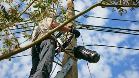 Electrical engineer with high voltage electricity pylon on the background of the Stock Footage 156793450