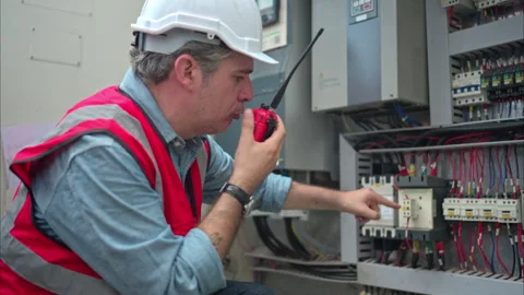 Electrical engineer inspects the electrical control board Stock-Footage 291920999