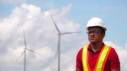 Electrical engineer man are standing monitoring of wind turbine Stock Footage 105727723