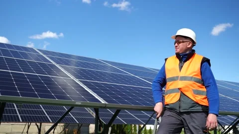 Electrical engineer posing while standing on a stepladder Stock Footage 168178559