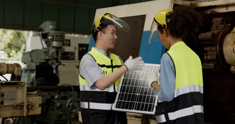 Electrical Engineer Technician is present solar panels for install Stock Footage 168940700