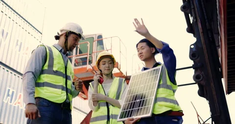 Electrical Engineer Technician is presenting solar panels for install Stock Footage 167366073
