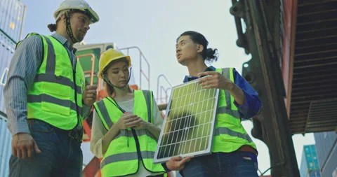 Electrical Engineer Technician is presenting solar panels Stock Footage 203839329