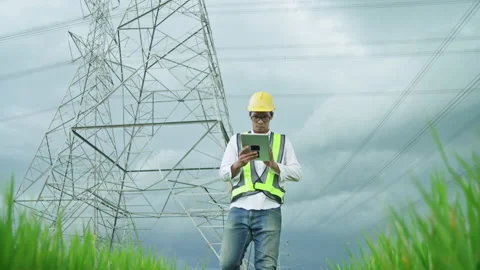 Electrical engineer using tablet working outdoors Stock Footage 156710954