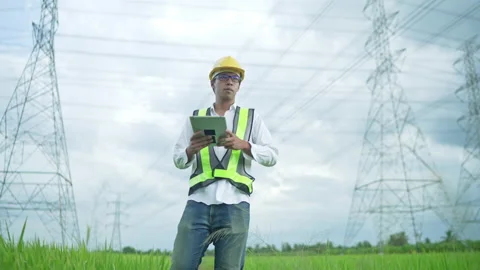Electrical engineer using tablet working outdoors Stock Footage 156710958