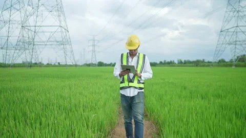 Electrical engineer using tablet working outdoors Stock Footage 156711050