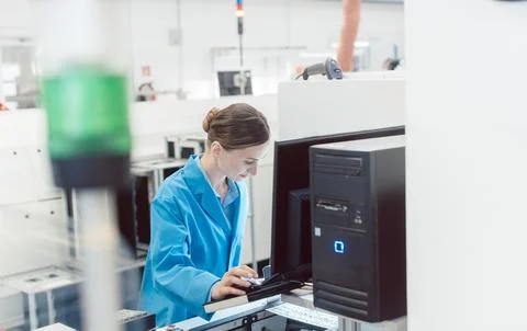 Electrical engineer working in electronics manufacturing 스톡 사진