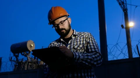 An electrical engineer works on a night shift. 스톡 동영상 95631223