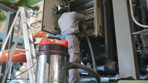 Electrical engineering working in factory Stockbeeldmateriaal 79729154