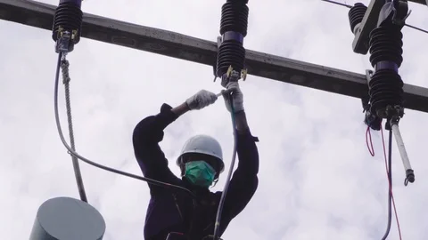 Electrical engineering is working on high voltage. Stock Footage 117754134