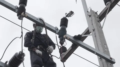 Electrical engineering is working on high voltage. Stock Footage 117754266